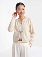 BLENIN knot button cardigan in cream, front portrait