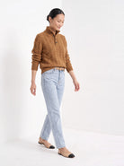 BLENIN cable button collar sweater in cognac, full outfit, walking
