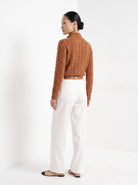 BLENIN cable button collar sweater in cognac, back view