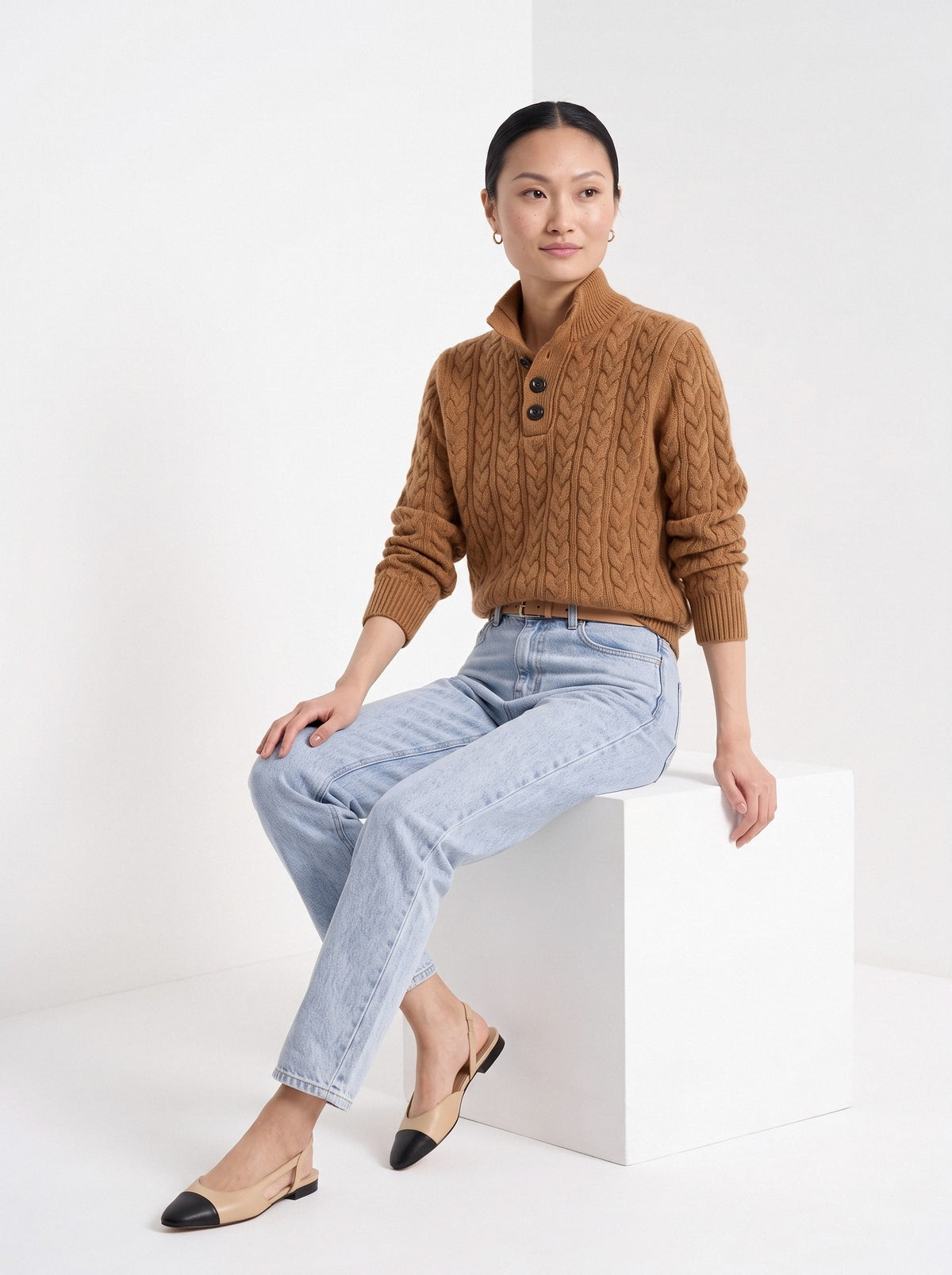 BLENIN cable button collar sweater in cognac, seated, full outfit
