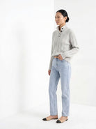 BLENIN cable button collar sweater in silver grey, three-quarter view