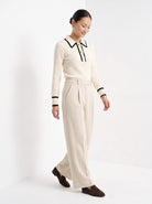 BLENIN contrast collar button sweater in cream, full outfit, walking