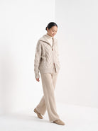 BLENIN wide collar cable zip cardigan in oatmeal, full outfit, walking