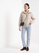 BLENIN wide collar cable zip cardigan in oatmeal, three-quarter view