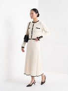BLENIN contrast trim cable cardigan in ivory, three-quarter view