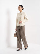 BLENIN stand collar fitted jacket in cream, three-quarter view