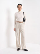 BLENIN cashmere mock neck sweater in milky, full-length front view