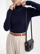 BLENIN cashmere mock neck sweater in navy, close-up of the details