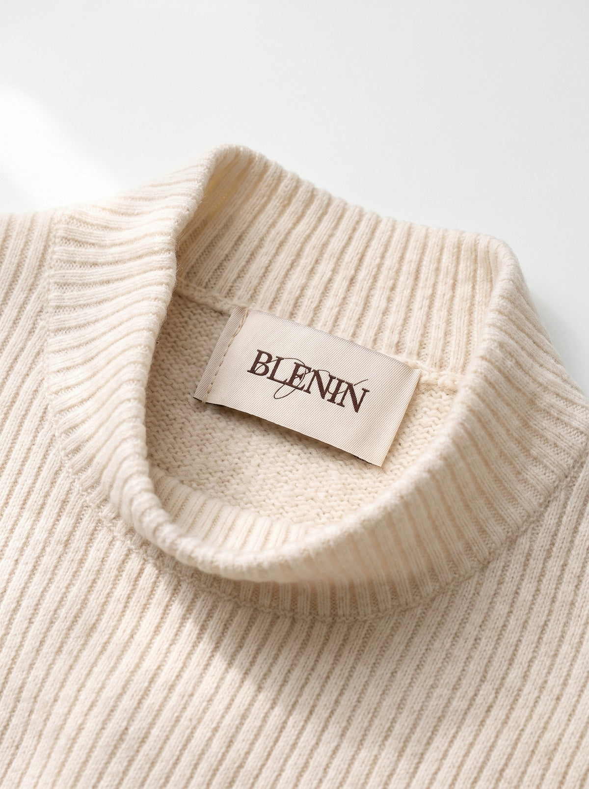 BLENIN cashmere mock neck sweater, woven BLENIN label