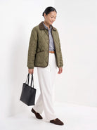 BLENIN quilted corduroy collar jacket in olive, full outfit, walking