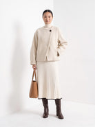 BLENIN collarless short coat in cream, full-length front view