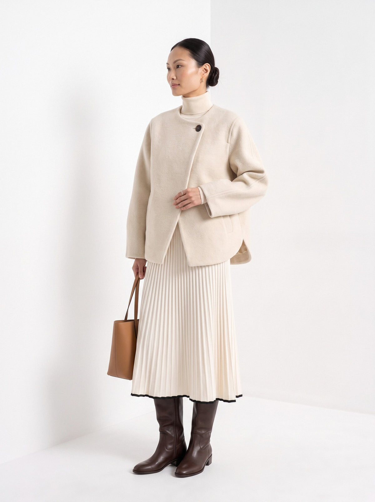 BLENIN collarless short coat in cream, three-quarter view