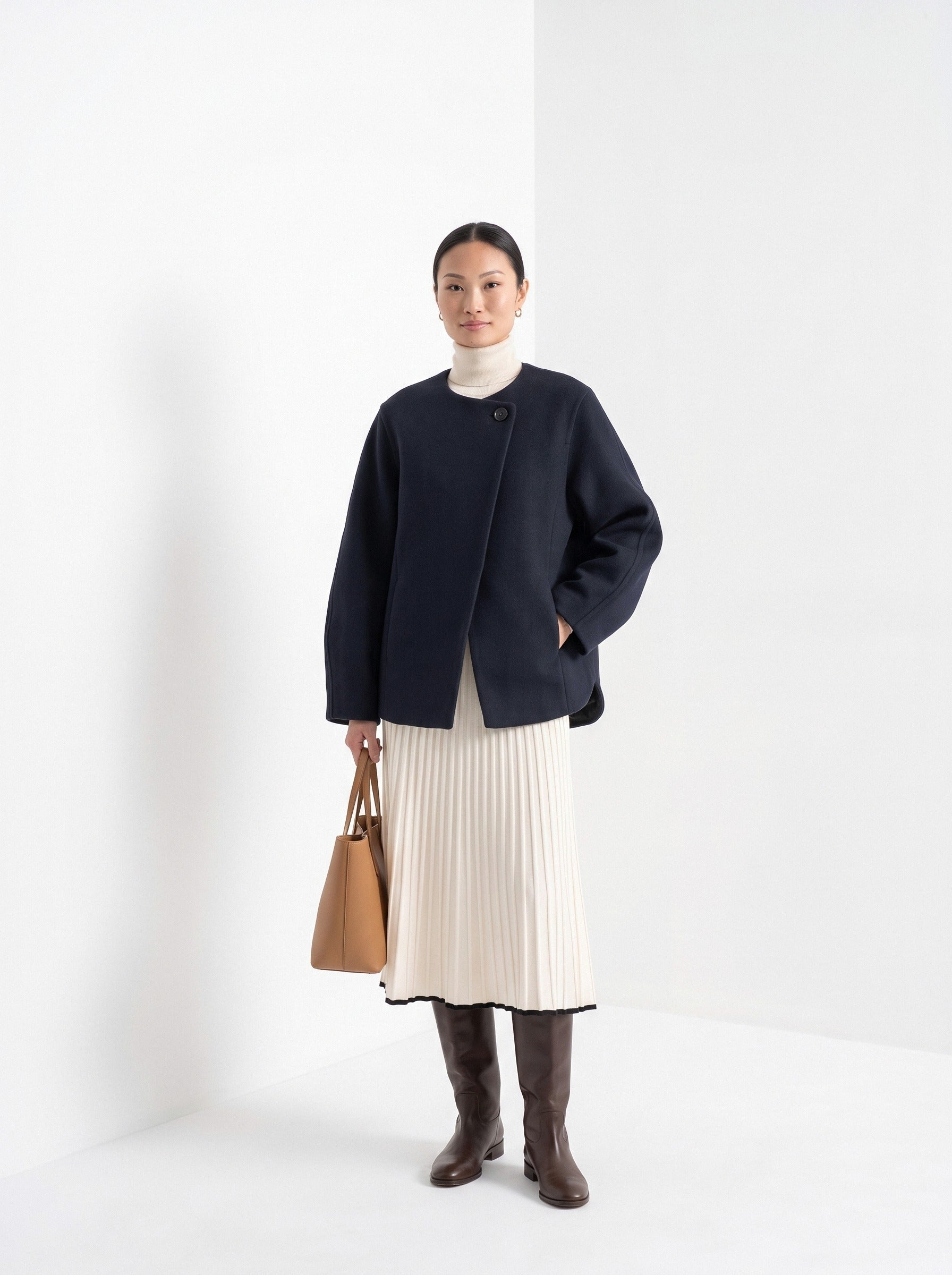 BLENIN collarless short coat in navy, full-length front view