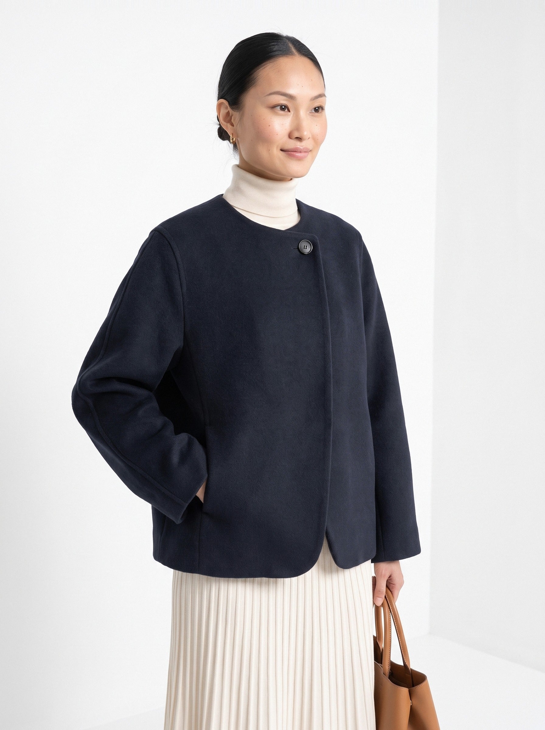 BLENIN collarless short coat in navy, front portrait
