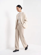 BLENIN knit wide leg trousers in beige, full outfit, walking