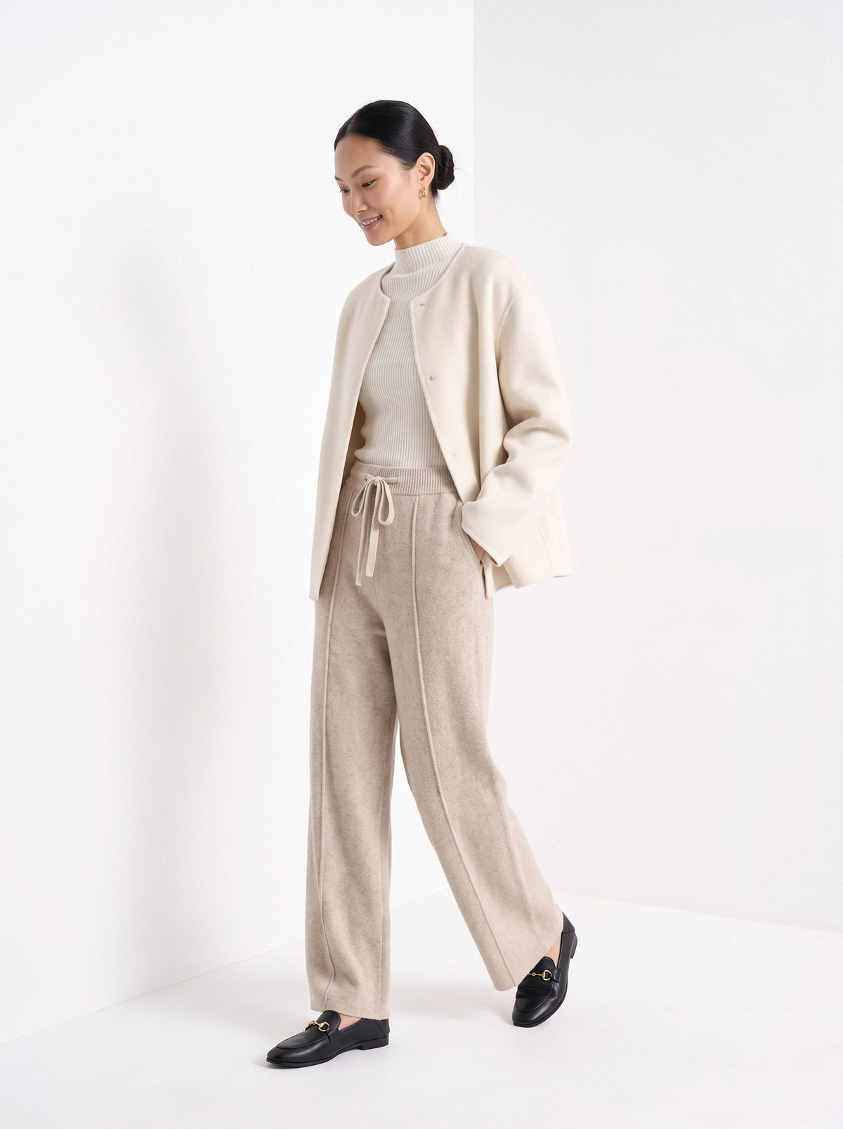 BLENIN knit wide leg trousers in beige, full outfit, walking