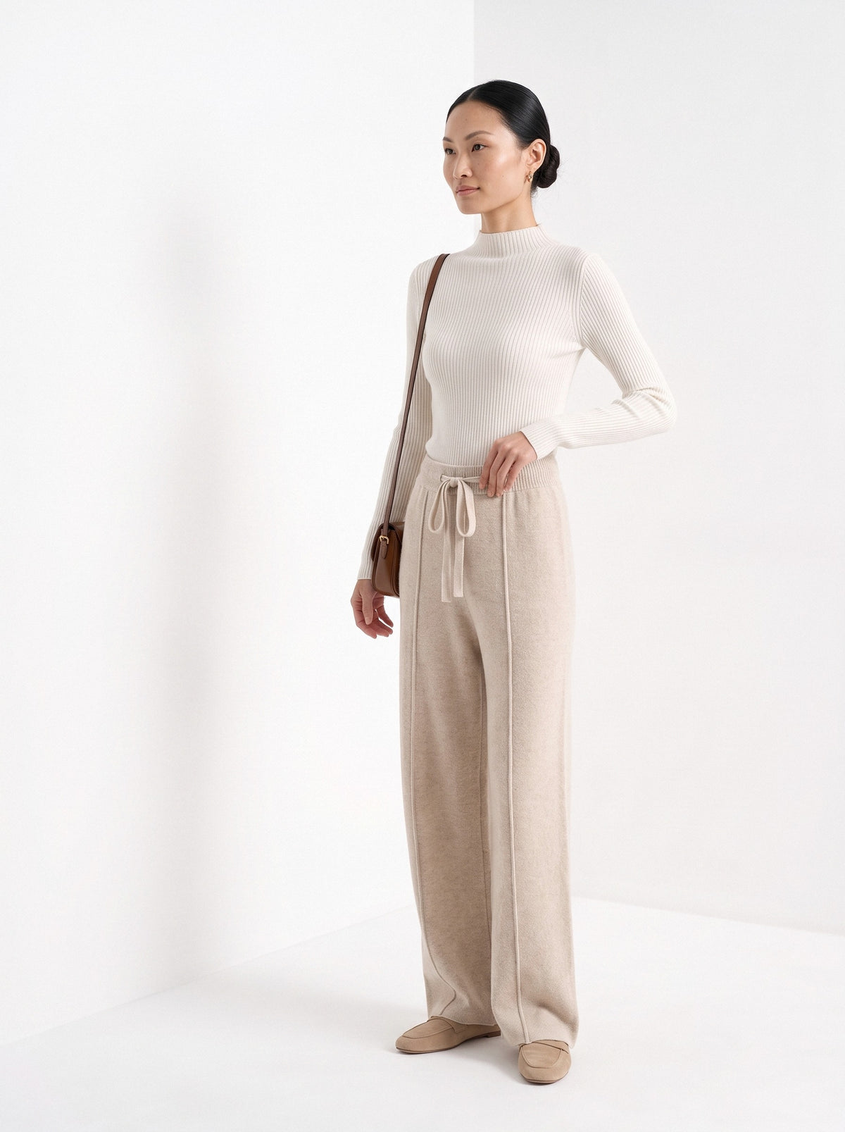 BLENIN knit wide leg trousers in beige, three-quarter view