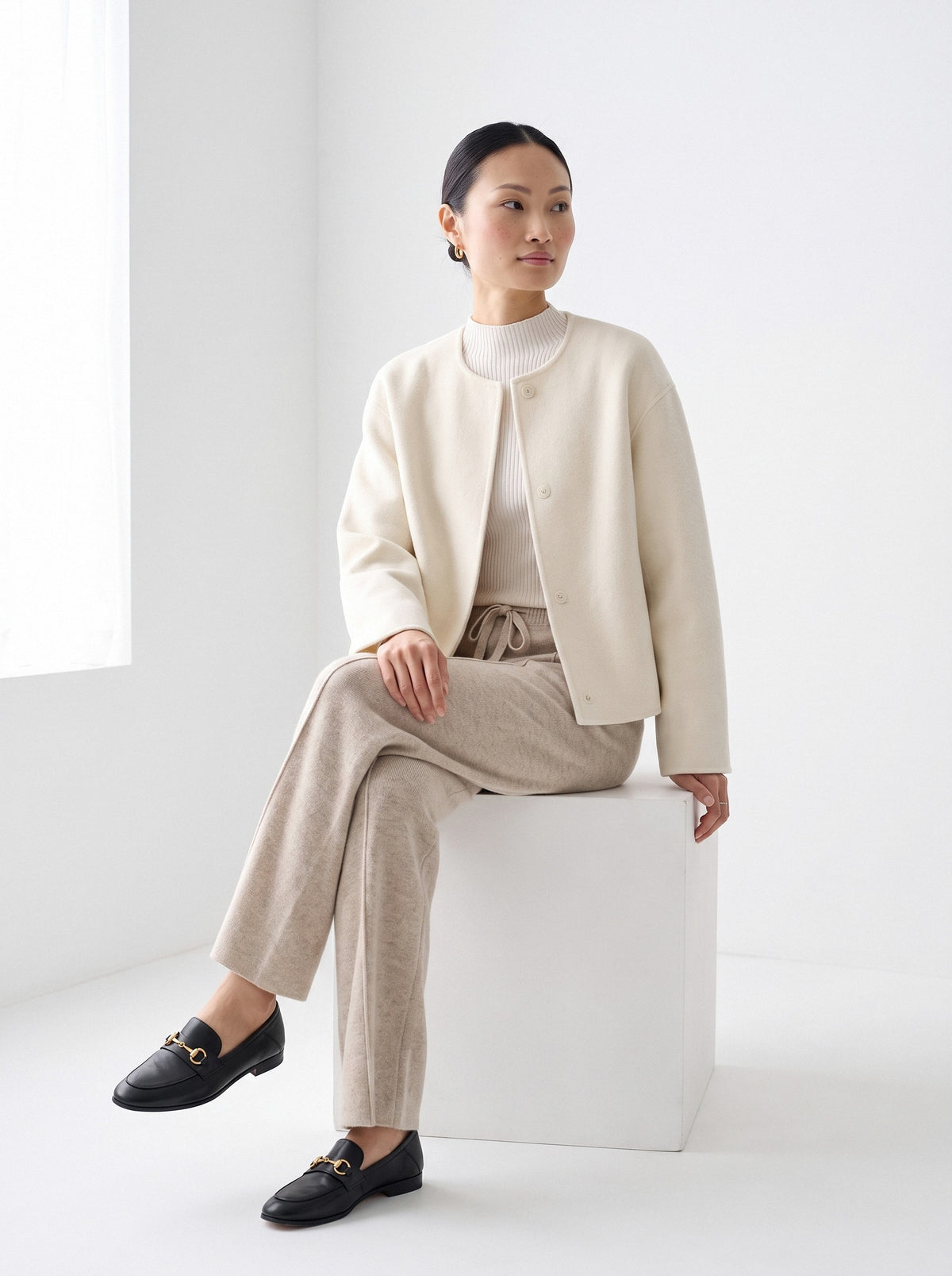 BLENIN knit wide leg trousers in beige, seated, full outfit