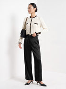 BLENIN satin wide leg trousers in black, three-quarter view