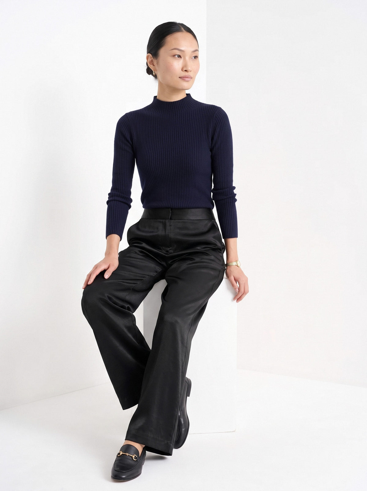 BLENIN satin wide leg trousers in black, seated, full outfit